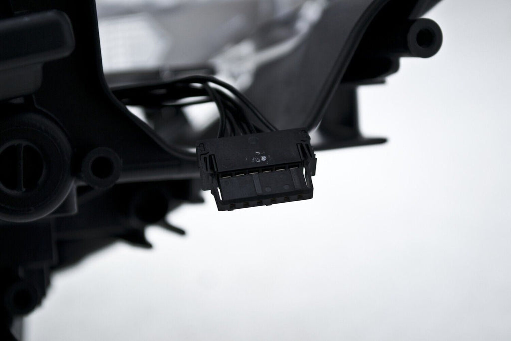 Hella Headlight Assembly for BMW 010131661