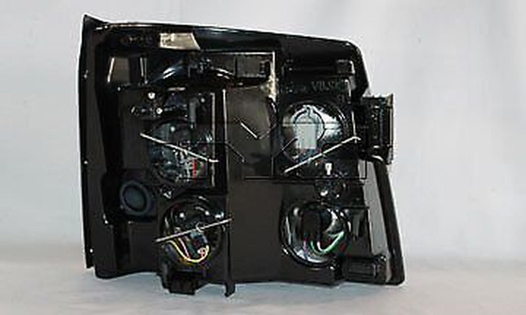 TYC Headlight Assembly for Cadillac 20-6710-00